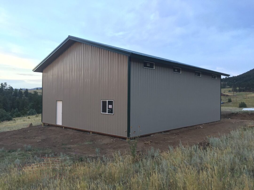 #8743 – Post frame building with Windows – Drake, CO | Steel Structures America