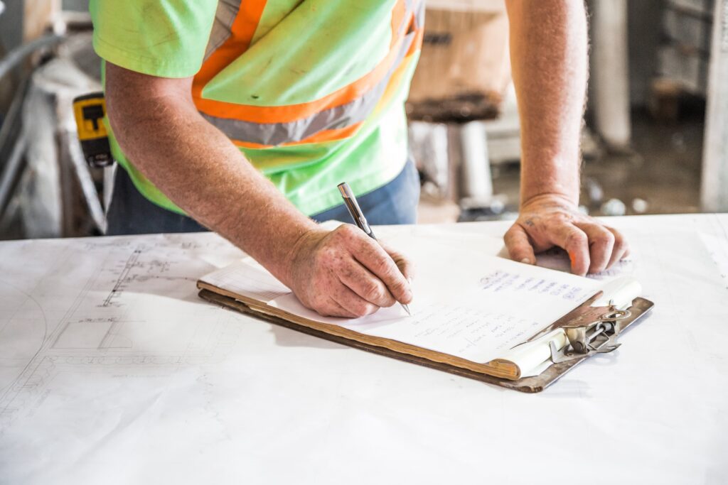 Engineer signing plans Engineering