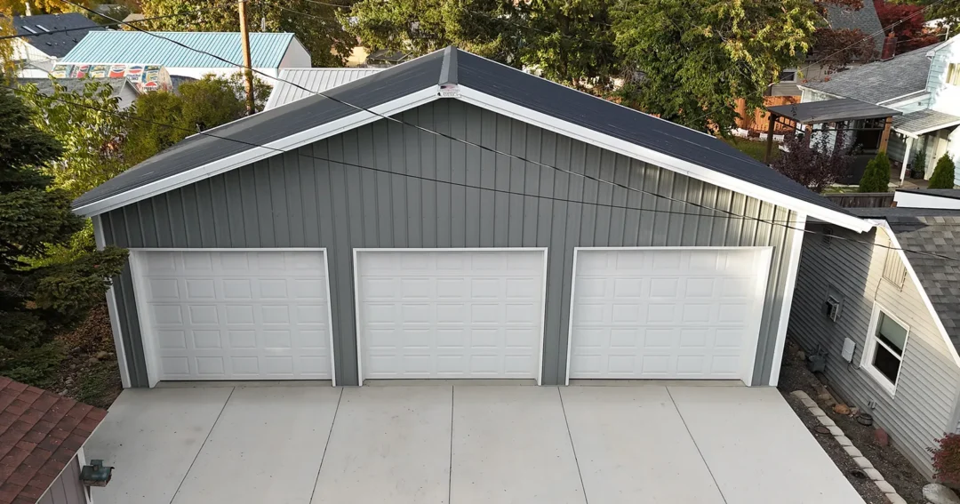 The cost of a pole barn can very based on size. The displayed garage is small and grey and on the lower end of the pricing scale