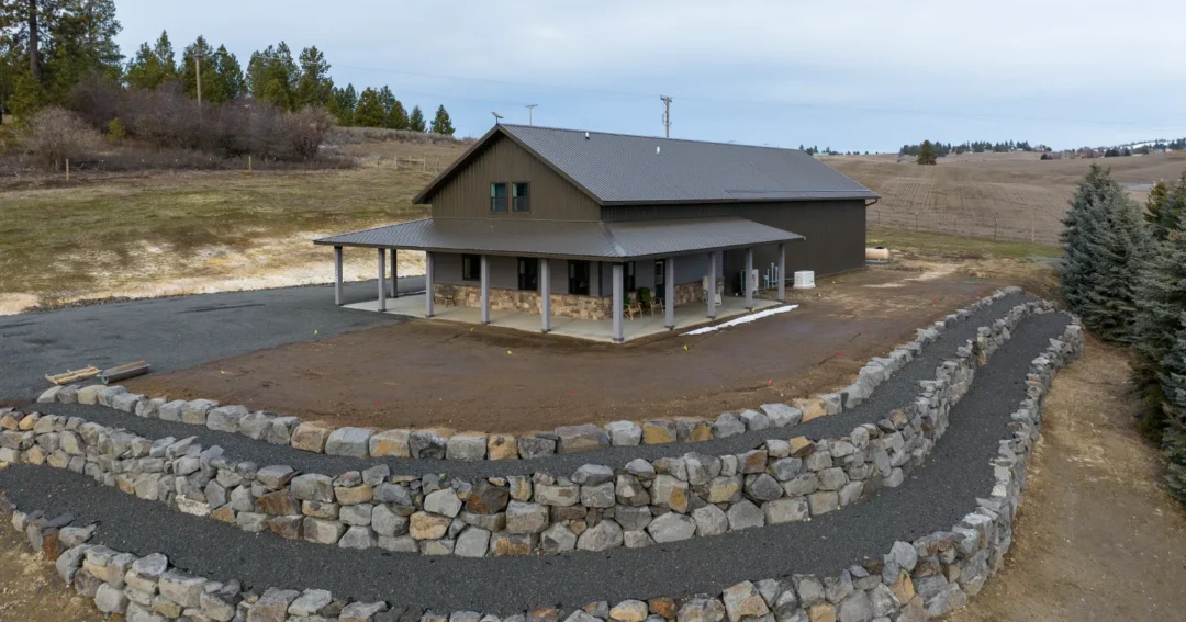 A beautiful brown pole barn home on the prairie as a buyer guide header