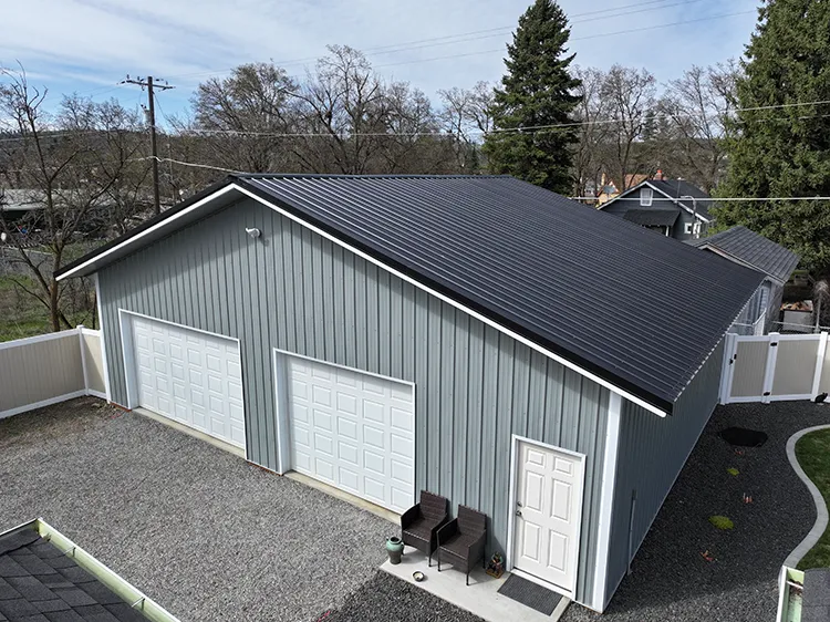 A large pole barn garage that can house 3 vehicles