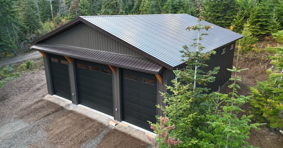 A grey post frame shop is pictured as a common type of post frame building