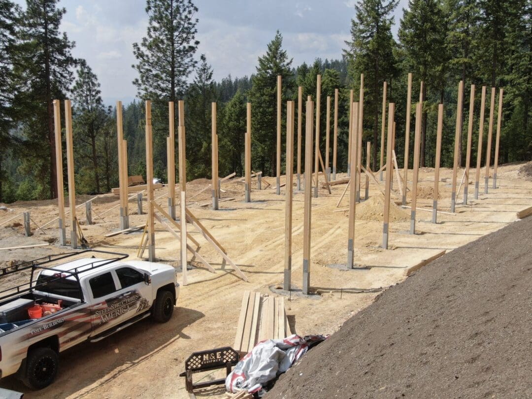 A pole barn concrete floor and foundation taking shape during construction