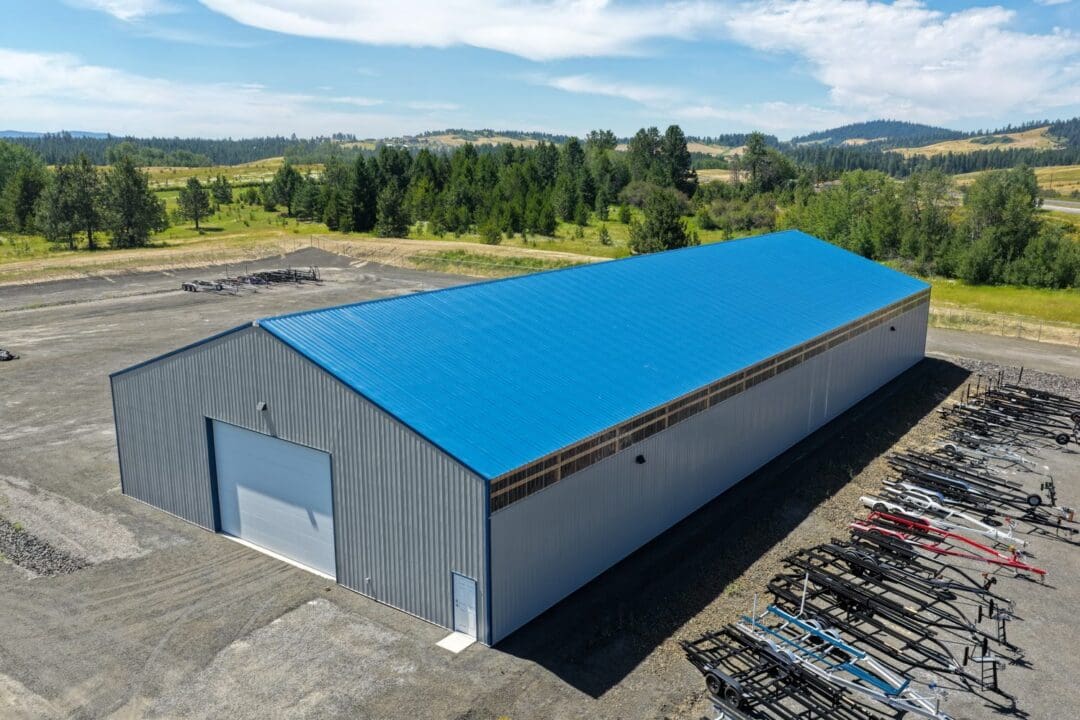 A finished post-frame building, faster to build and more open than stick-frame