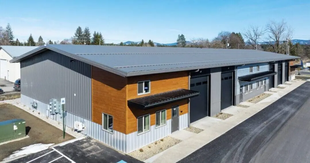 Multi-tenant commercial steel building by Steel Structures America, the kind of span red iron metal buildings target