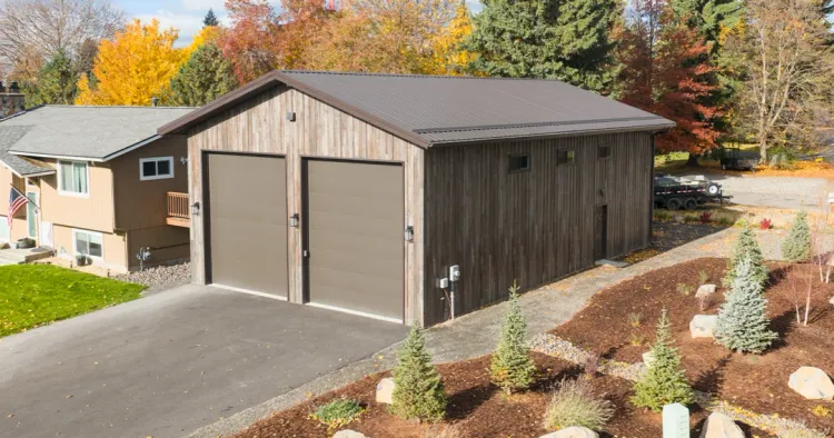 A large post-frame workshop building used as a shop, built by Steel Structures America