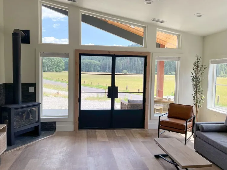 Open living room inside a luxury barndominium with living quarters in Coeur d'Alene, Idaho