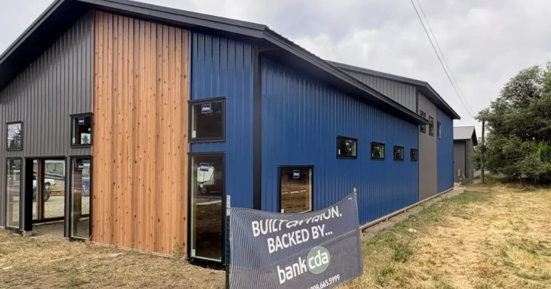Custom steel buildings like this Coeur d'Alene, Idaho commercial build with wood grain steel siding