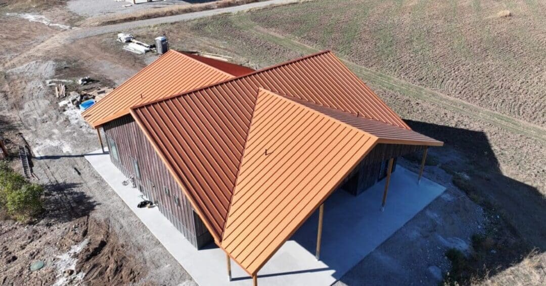 Aerial view of a 50x50 barndominium house in Priest River, Idaho, built by Steel Structures America