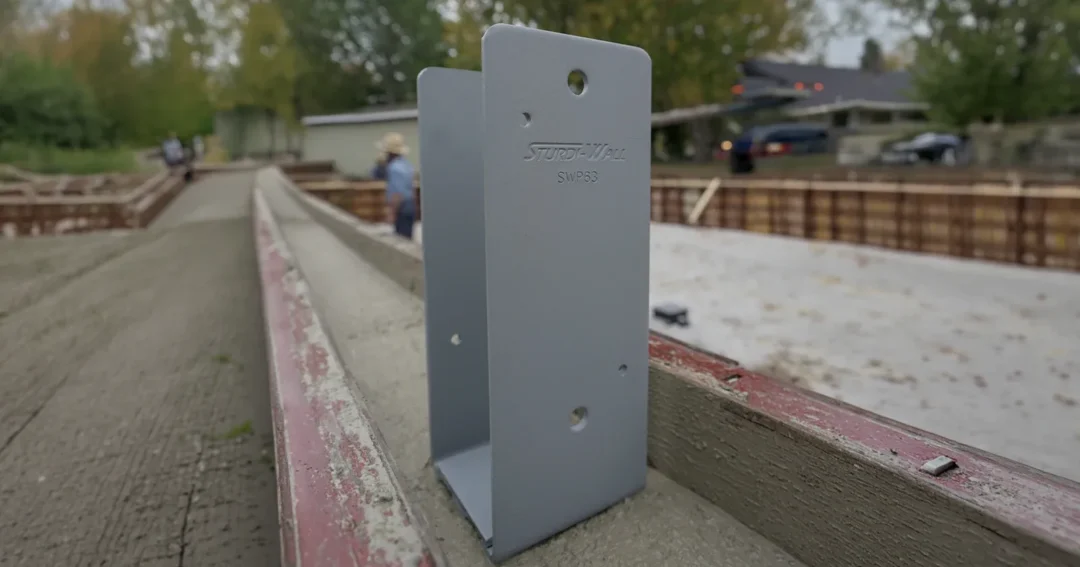 A sturdi-wall bracket sitting on a concrete wall base