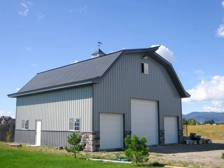 2 story gambrel style steel building in Post Falls, Idaho, with upper-level space under a gambrel truss roof